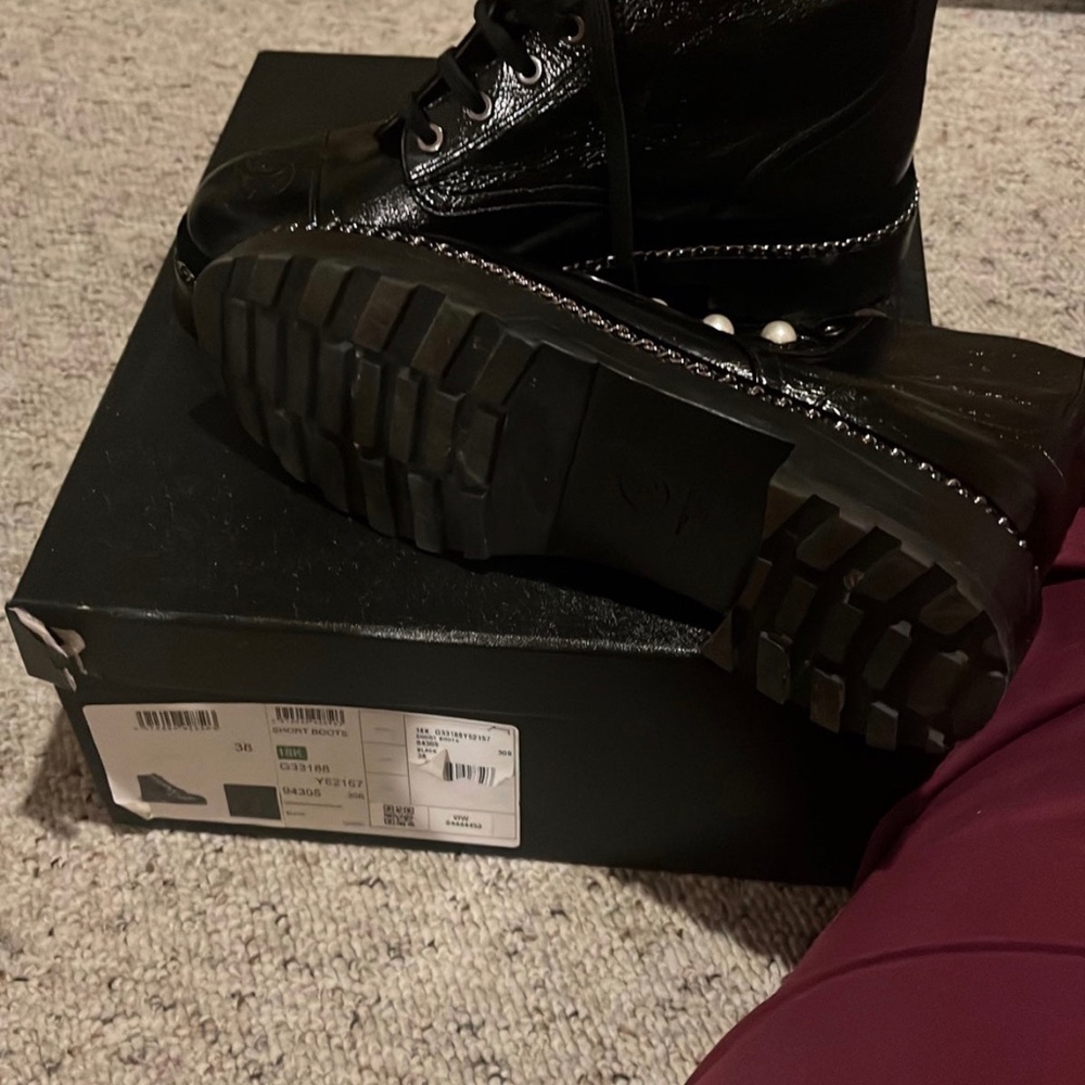 Black Chanel boots